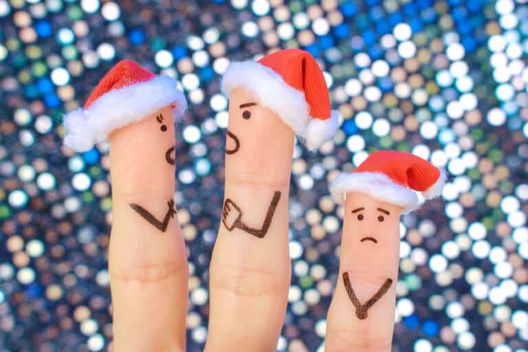 angry fingers in Santa hats