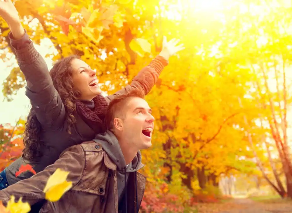 Happy Couple in Autumn Park.